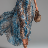 Megan — Long chiffon dress with leopard print and bare shoulders