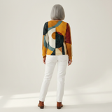 Deirdre — Jumper made of structured material with geometric patterns