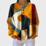Deirdre — Jumper made of structured material with geometric patterns