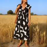 Muireann — Flowing dress with V-neck