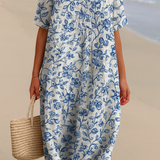 Laura — Ivory Dress Adorned with Porcelain Blue Floral Accents